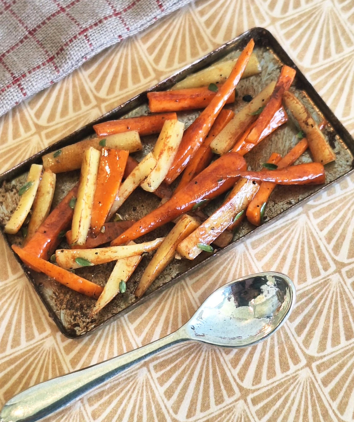 Honey roasted Carrot and Parsnips (with metal serving spoon)