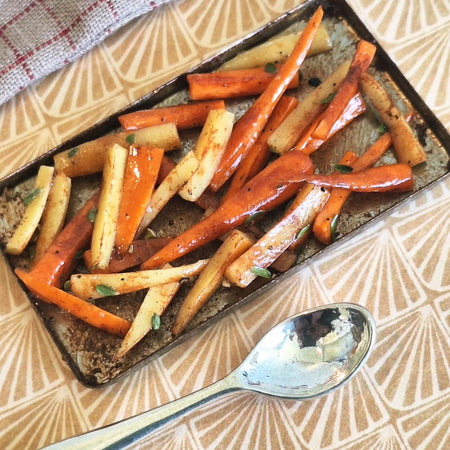 Honey roasted Carrot and Parsnips (with metal serving spoon)