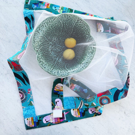 Budgies and flowers weighted mesh food cover.