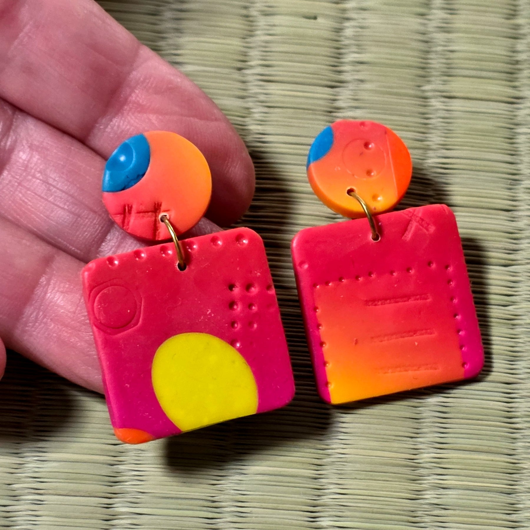 Orange stud earrings