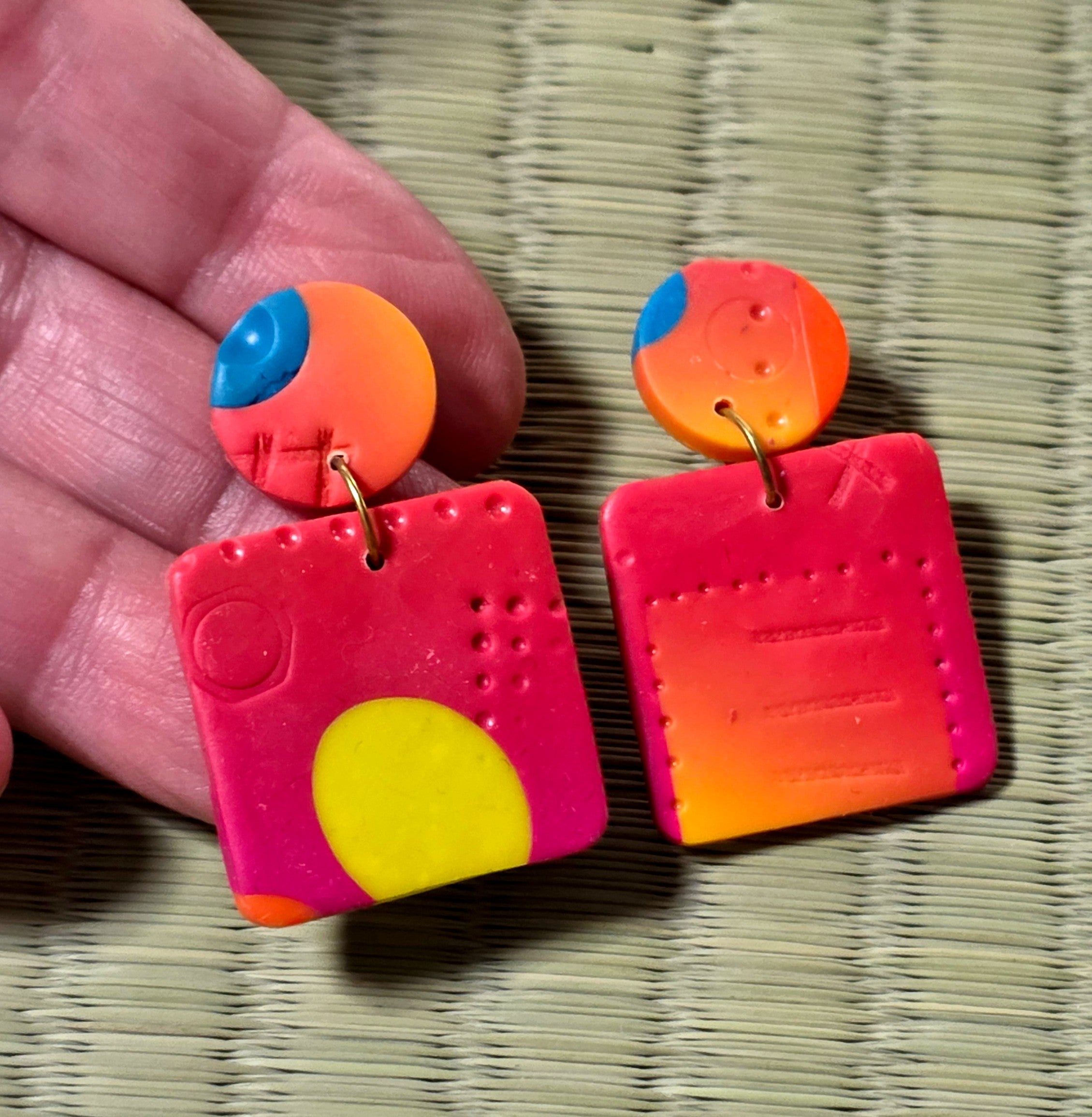 Orange stud earrings