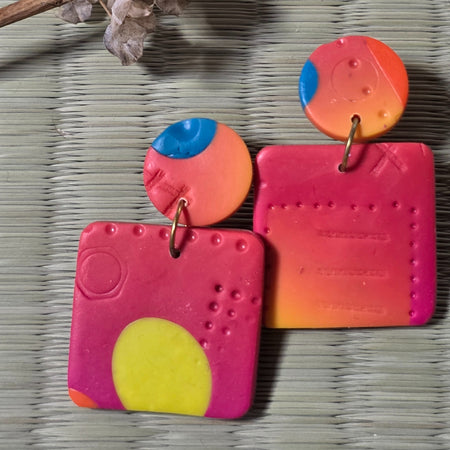 Orange stud earrings