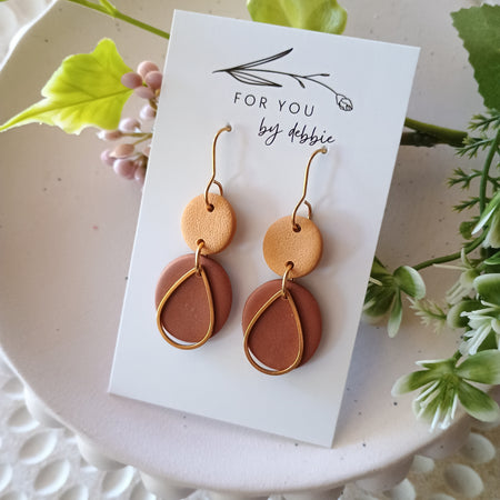Brown and gold dangle earrings with teardrop charm