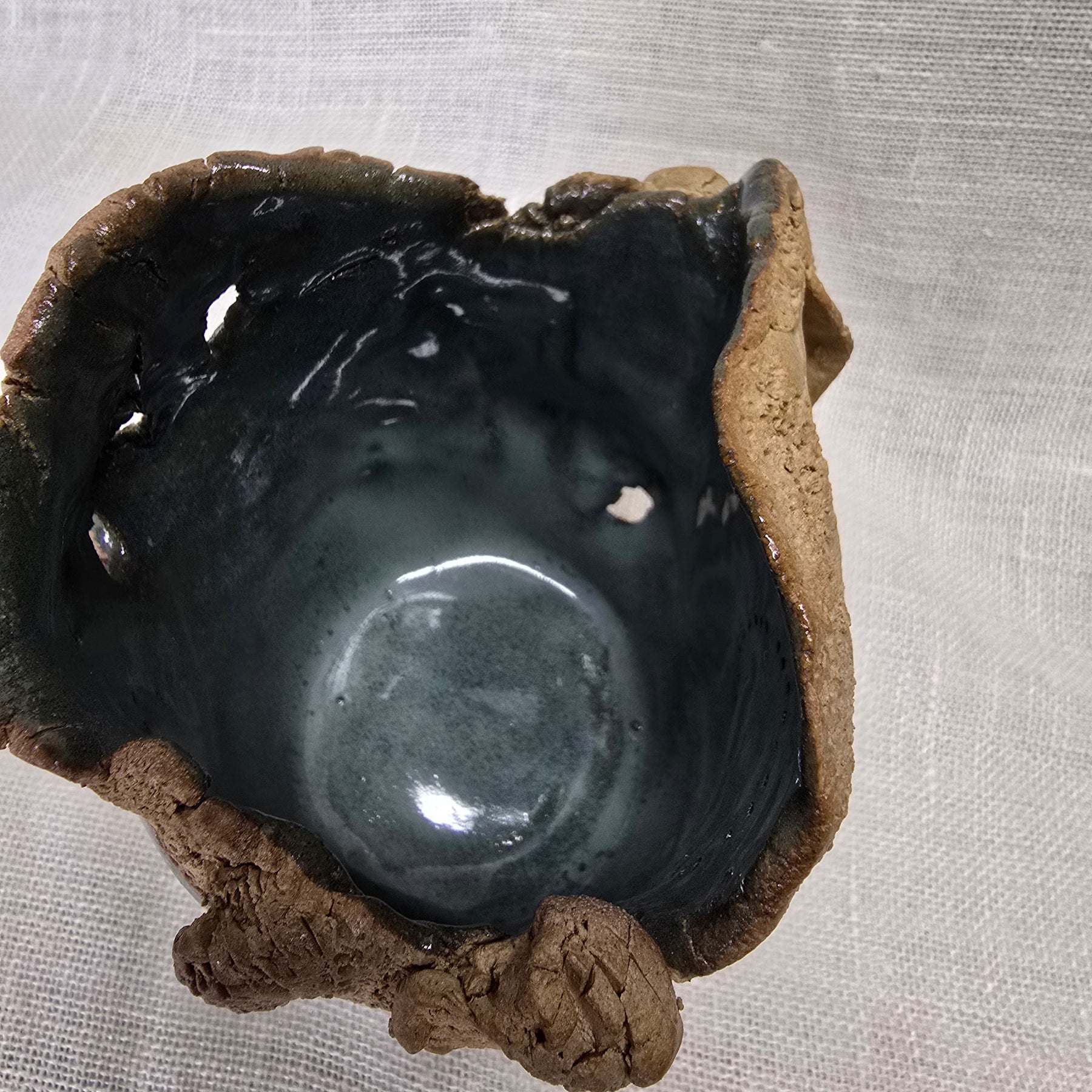 Rockpool series.  Stunning, hand carved pot