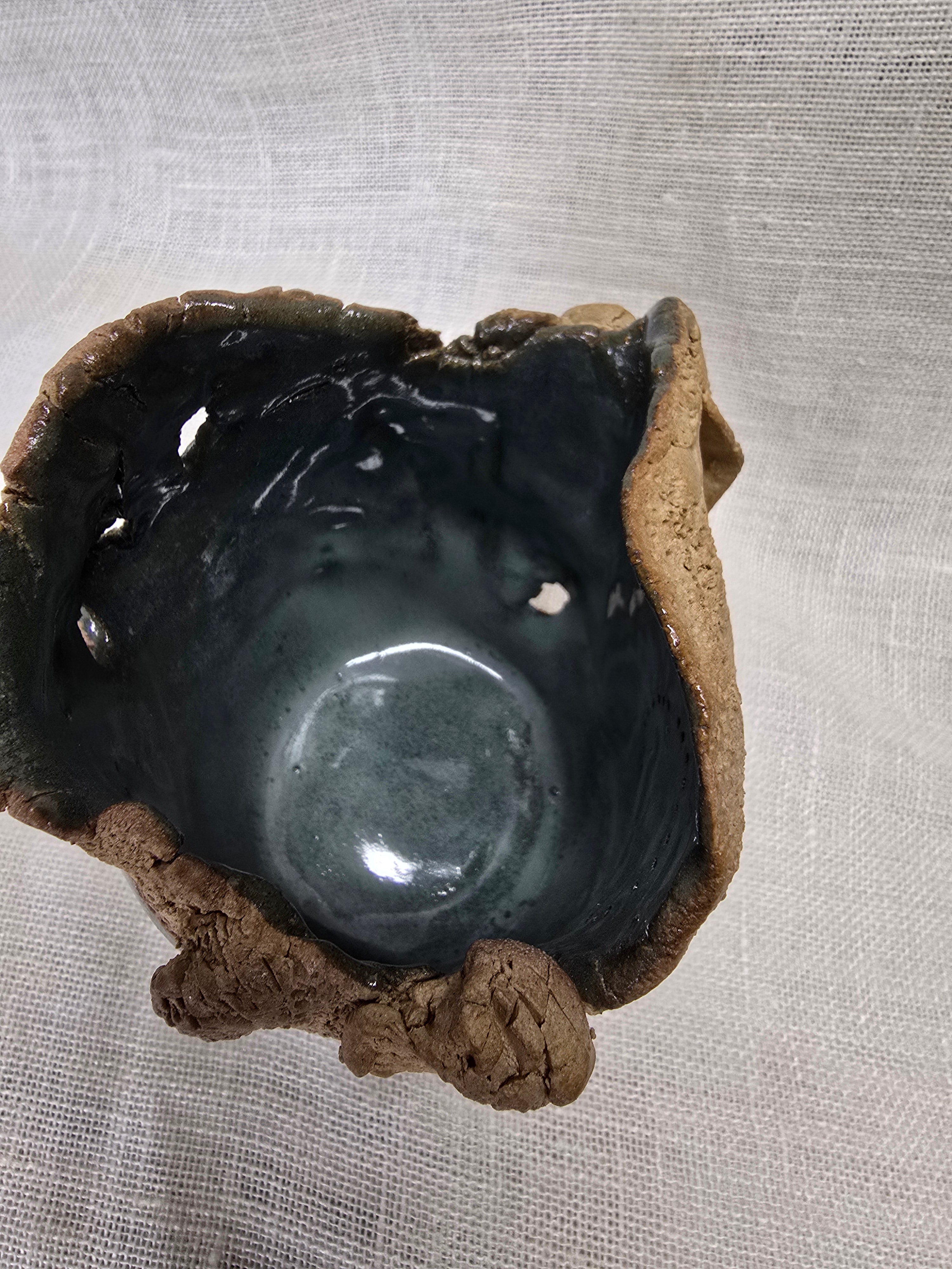 Rockpool series.  Stunning, hand carved pot