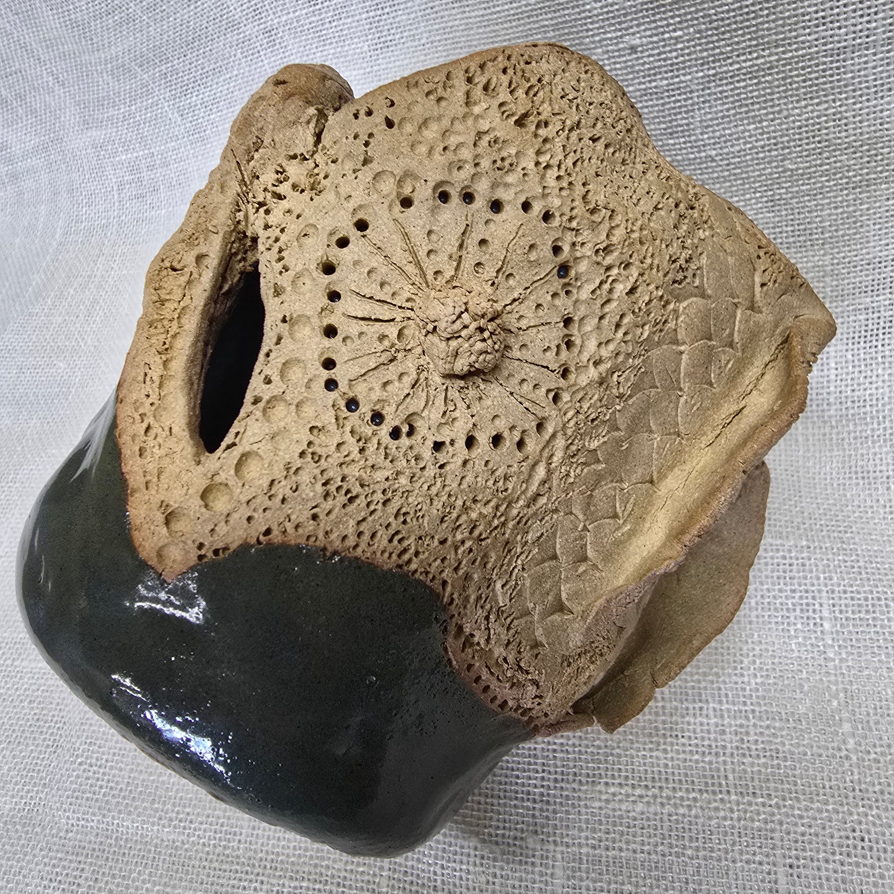 Rockpool series.  Stunning, hand carved pot