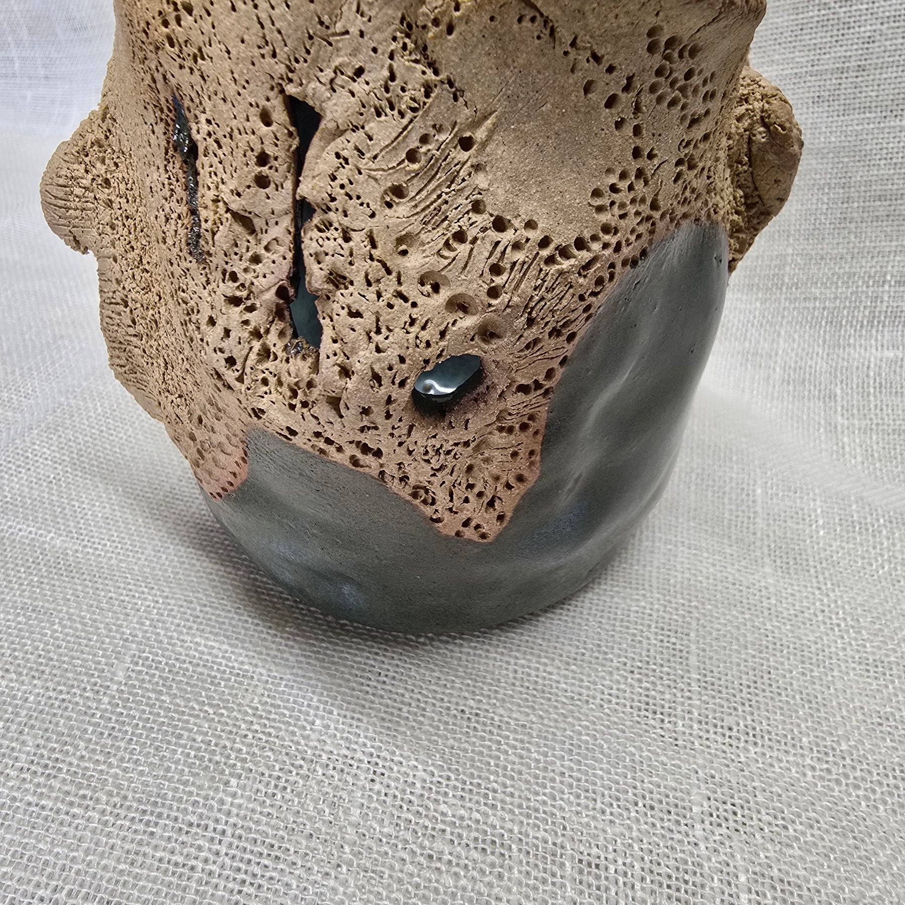 Rockpool series.  Stunning, hand carved pot
