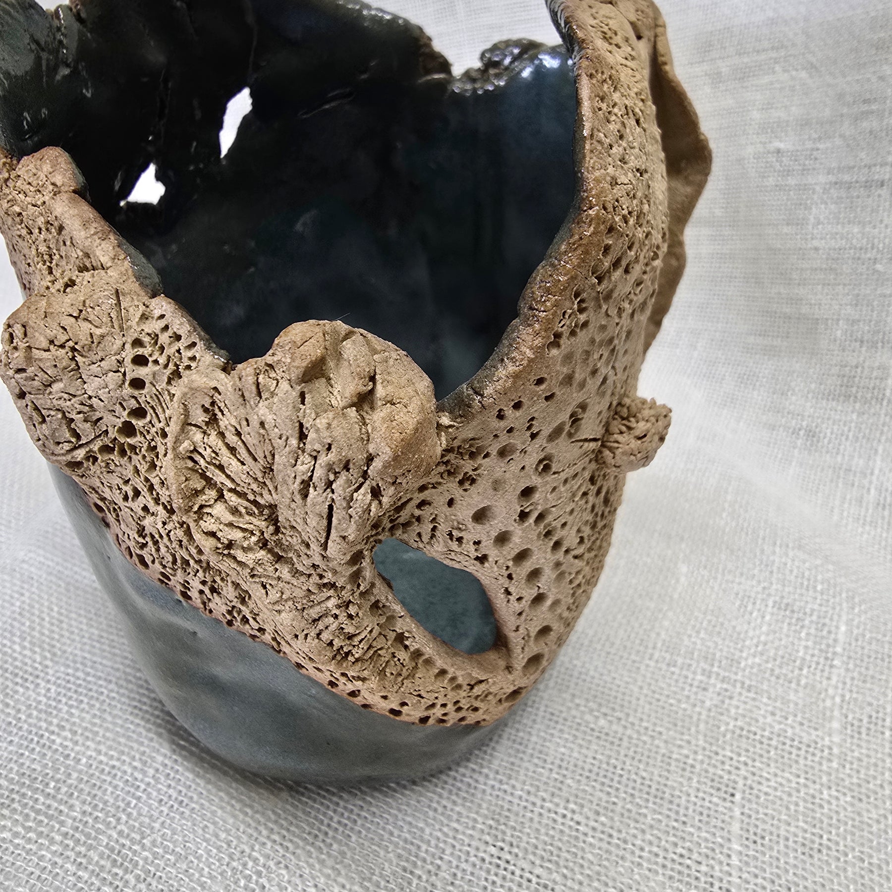 Rockpool series.  Stunning, hand carved pot