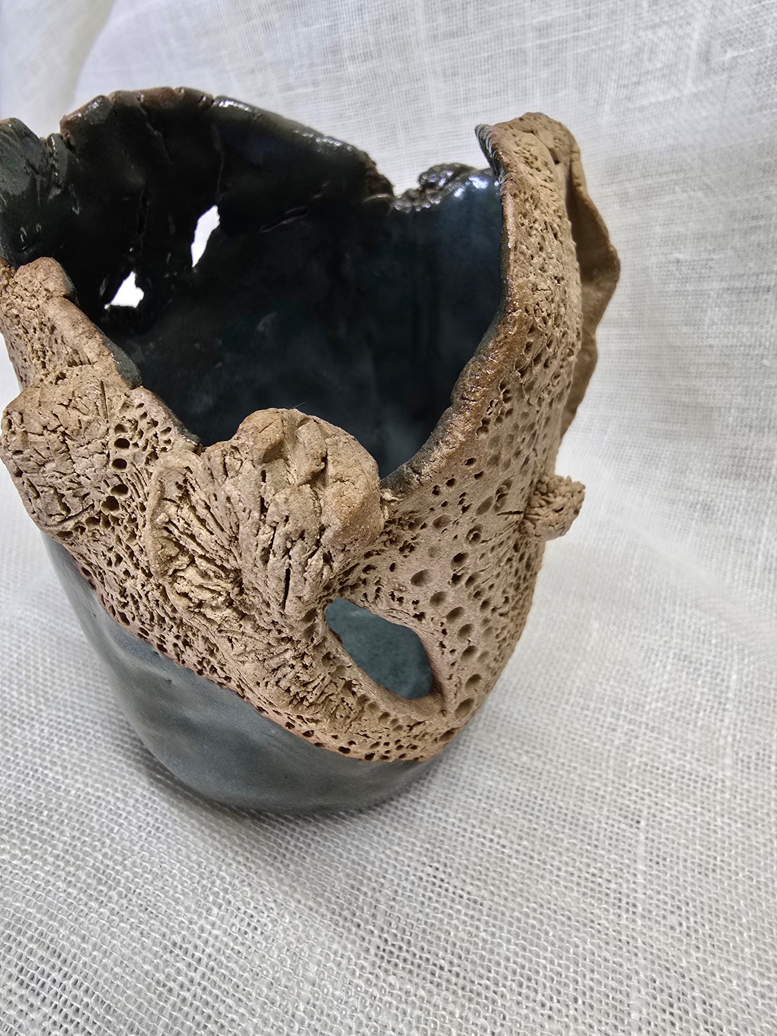 Rockpool series.  Stunning, hand carved pot
