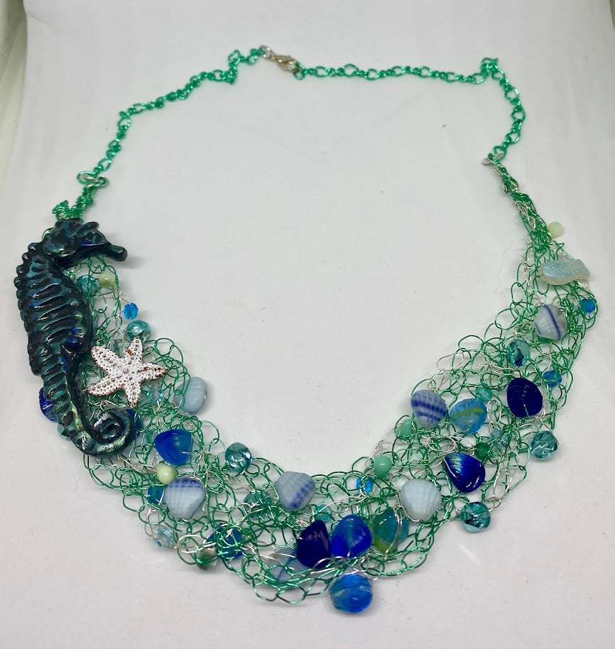 Beaded wire crochet necklace with seahorse focal