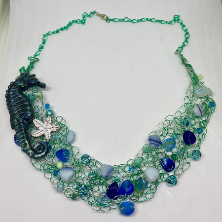 Beaded wire crochet necklace with seahorse focal