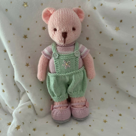 Handknitted bear with clothes