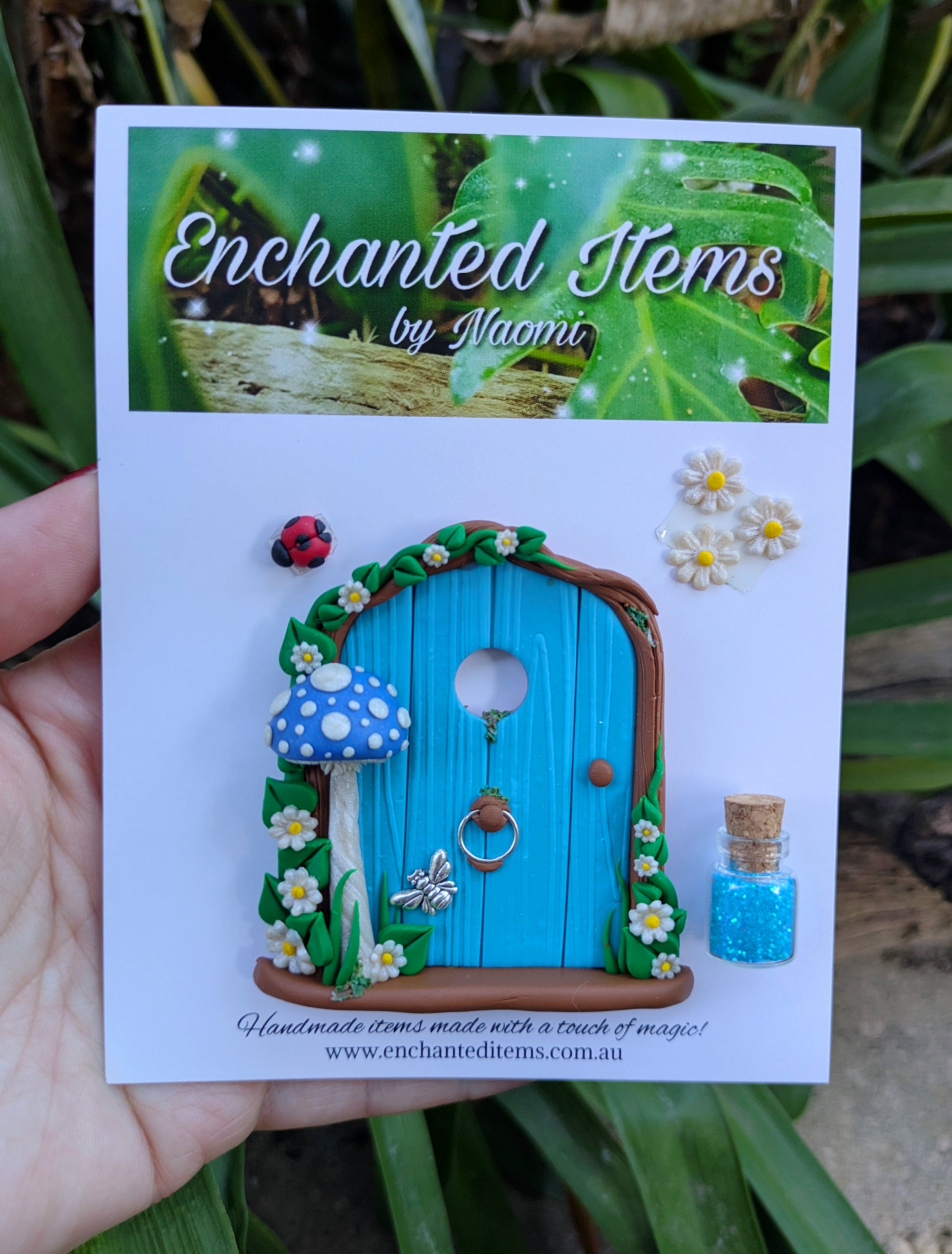 Mini Blue Fairy Door with a Mushroom, Flowers & Silver Bumblebee