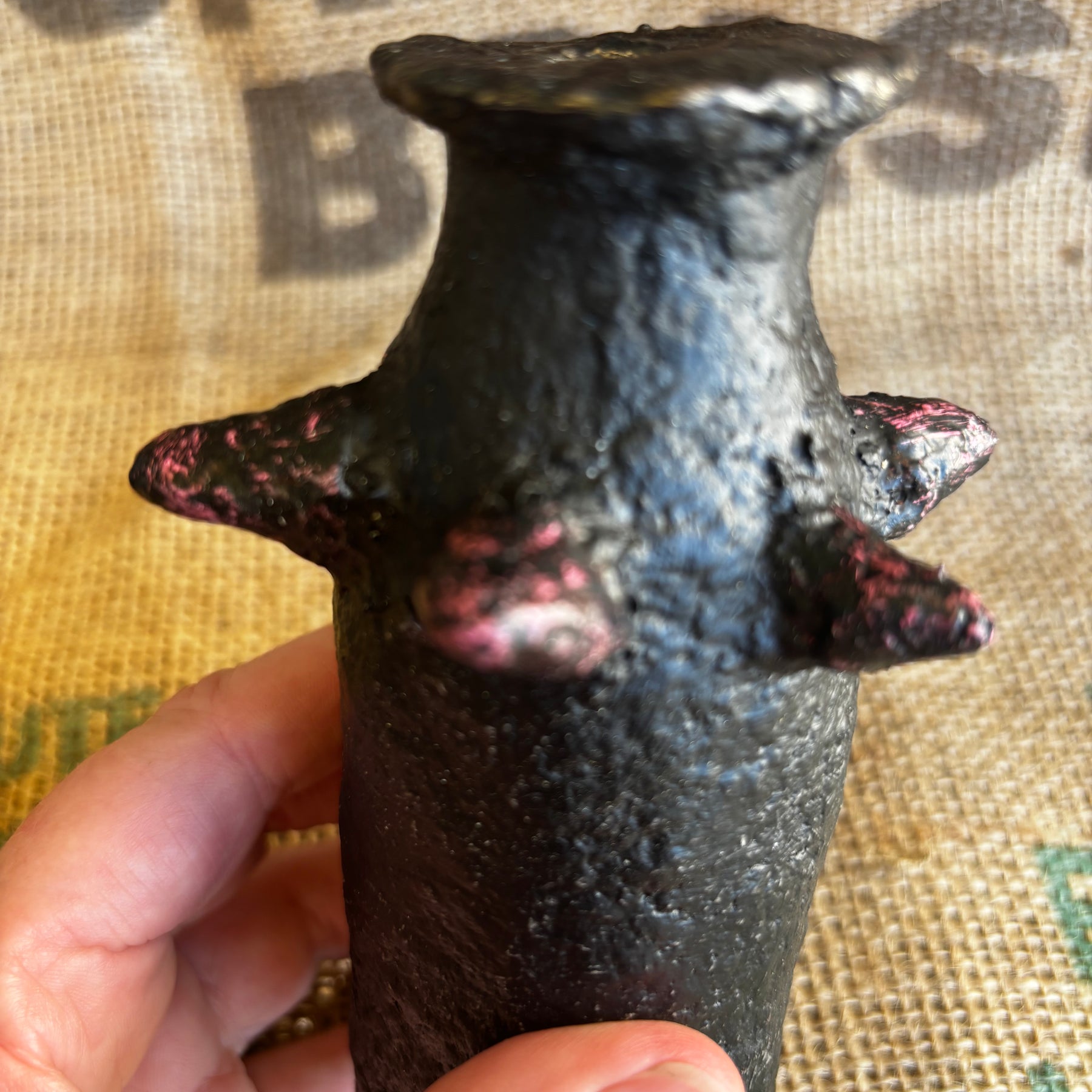 Small vase with pinkish studs