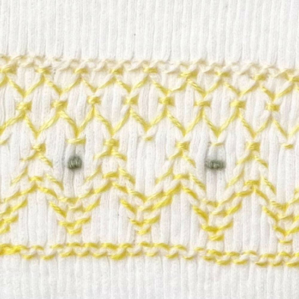 Baby-singlet-yellow-smocked-close-up