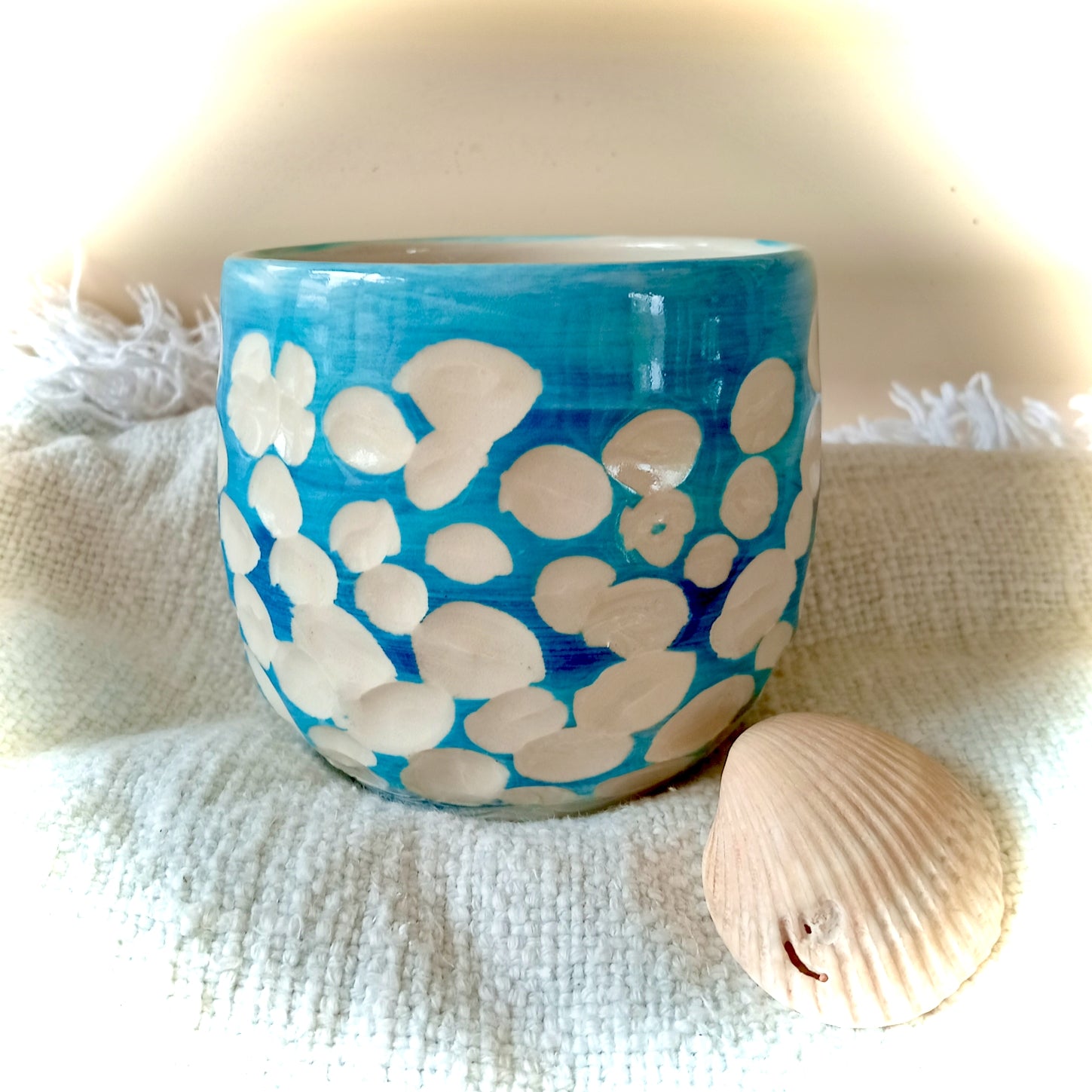 Blue and white abstract clouds cup