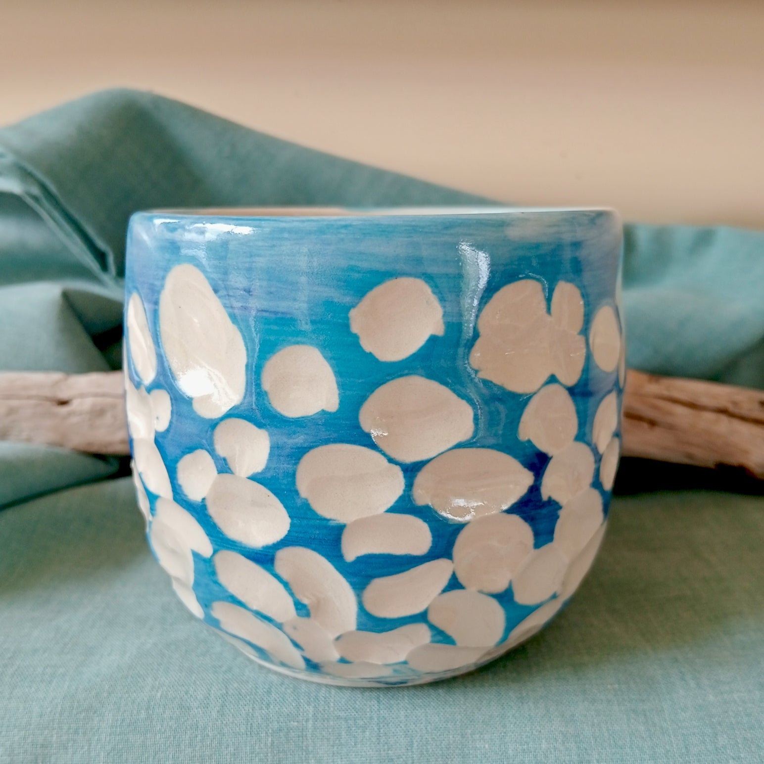 Blue and white abstract clouds cup