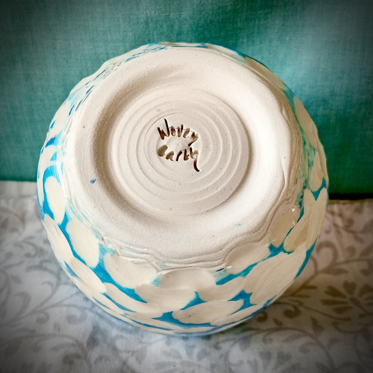Blue and white abstract clouds cup