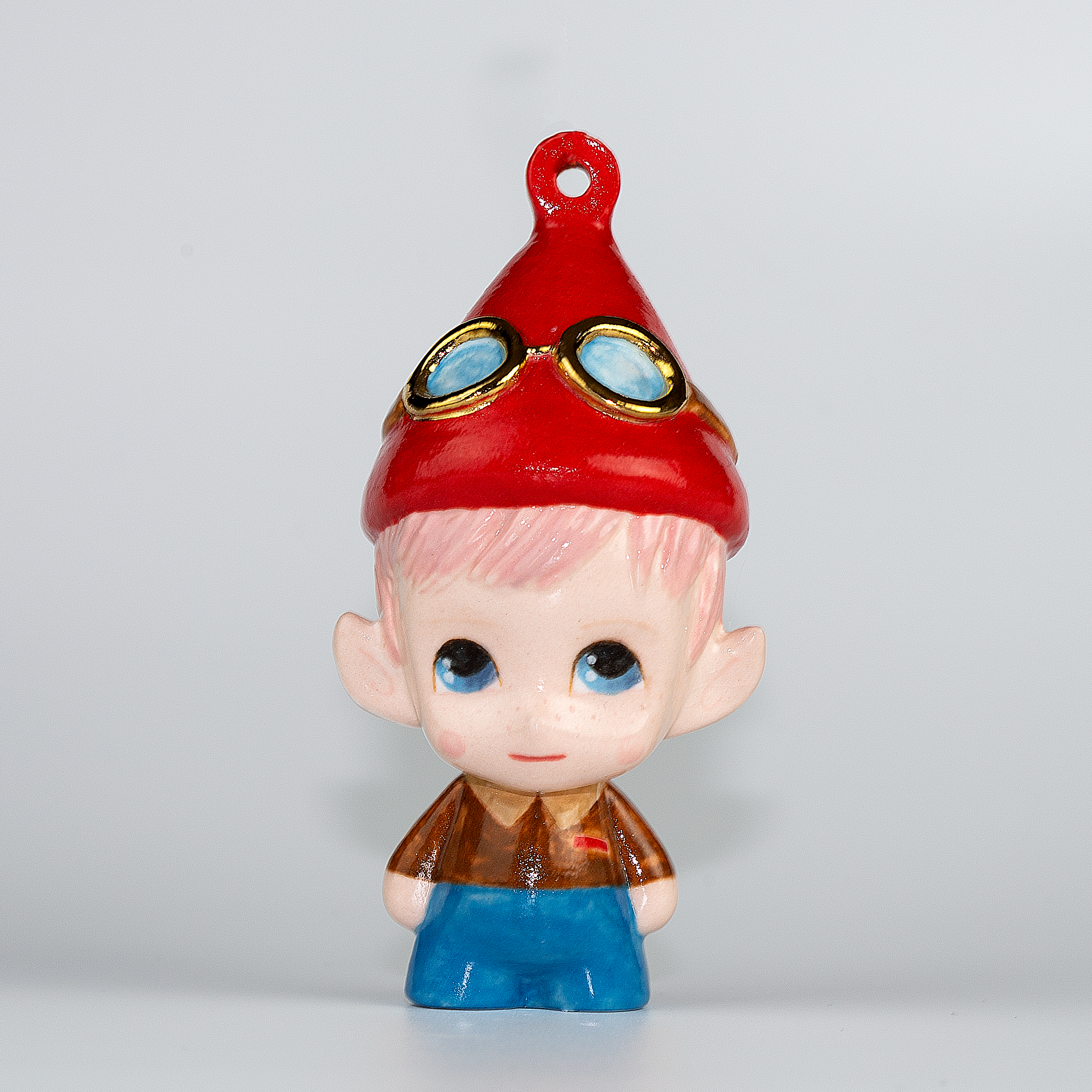 Handmade Porcelain Christmas ornament. One-of-a-kind. Malakai the Pilot Elf.