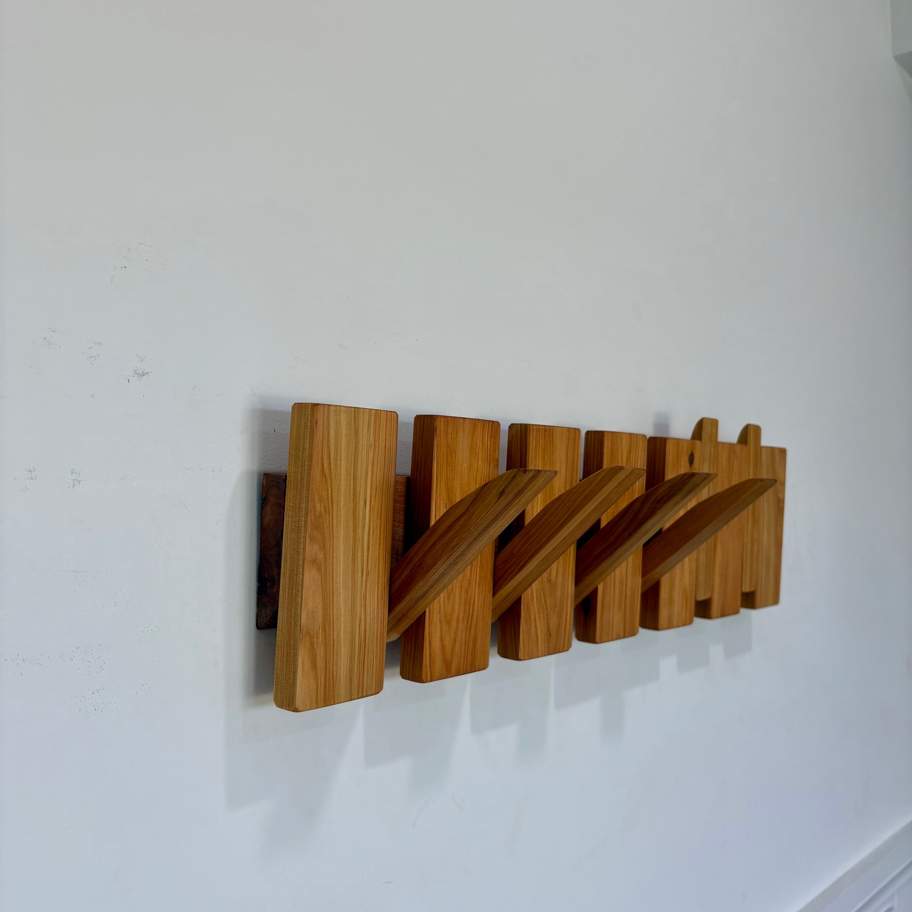 Cypress piano style coat rack extra wide