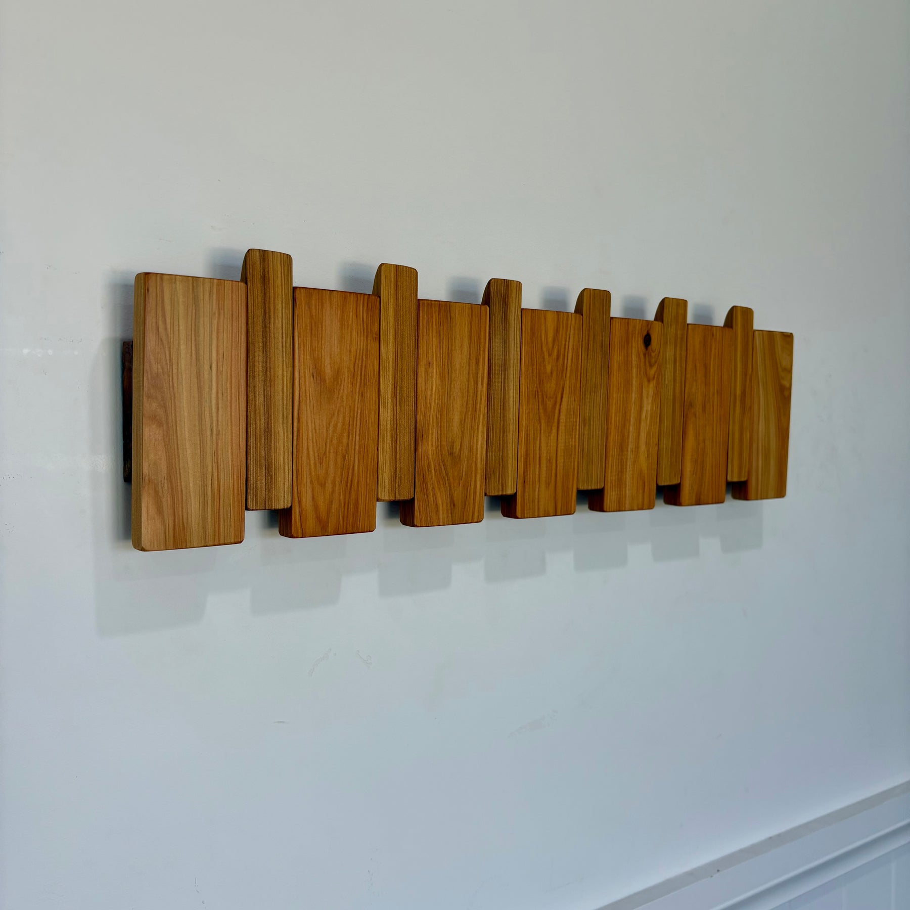 Cypress piano style coat rack extra wide