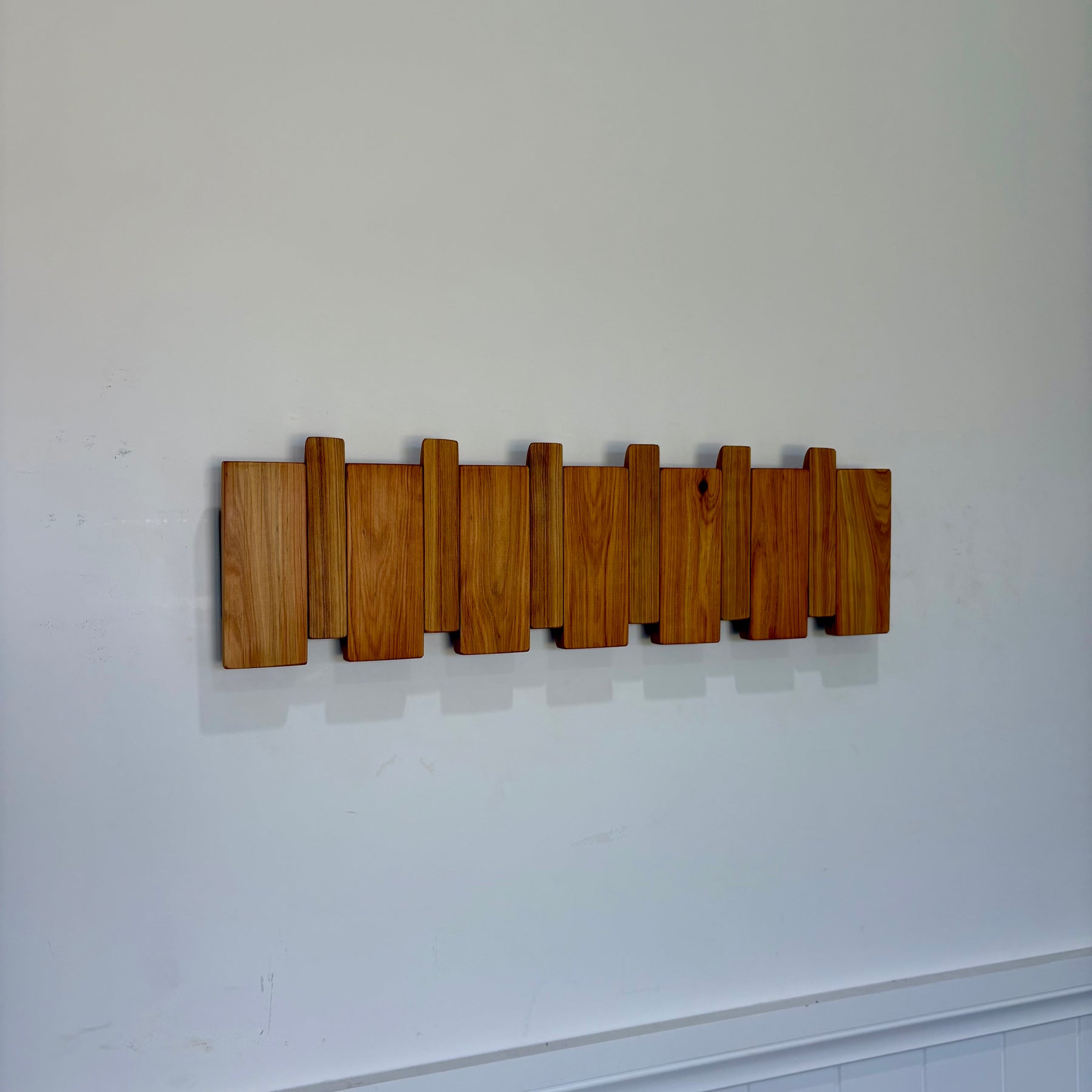 Cypress piano style coat rack extra wide