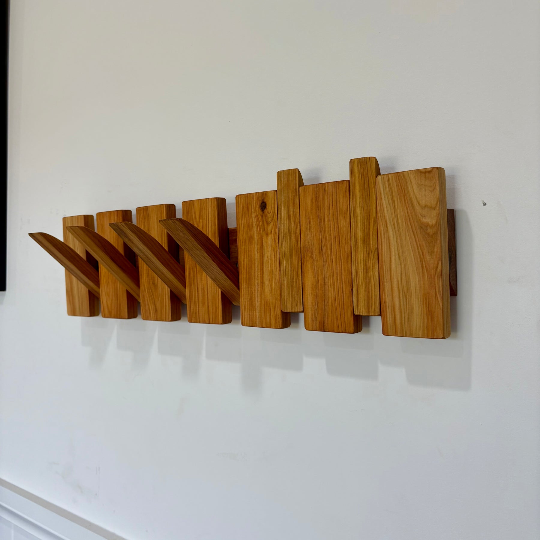 Cypress piano style coat rack extra wide