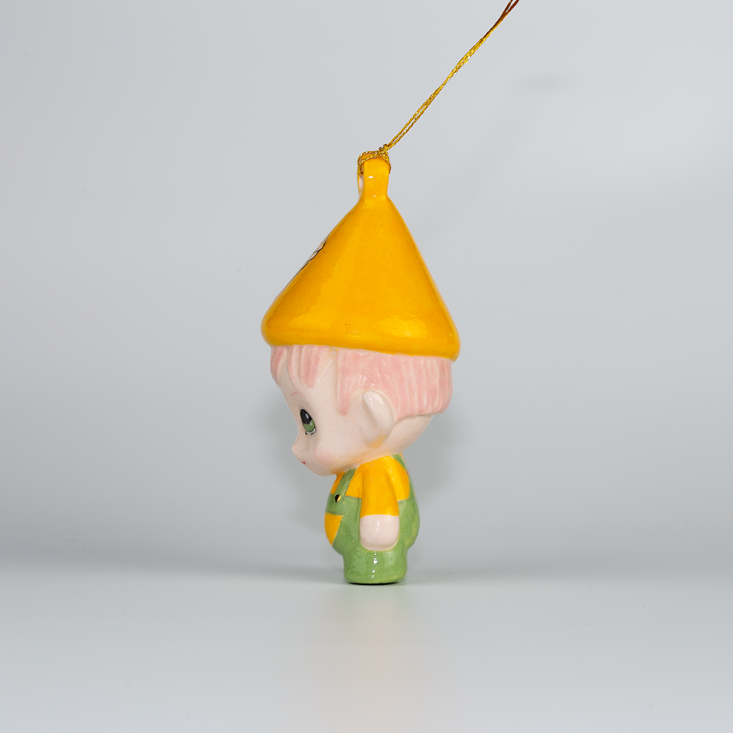 Candy from Dairy Delights. One-of-a-kind Handmade Porcelain Christmas ELF figurine ornament.