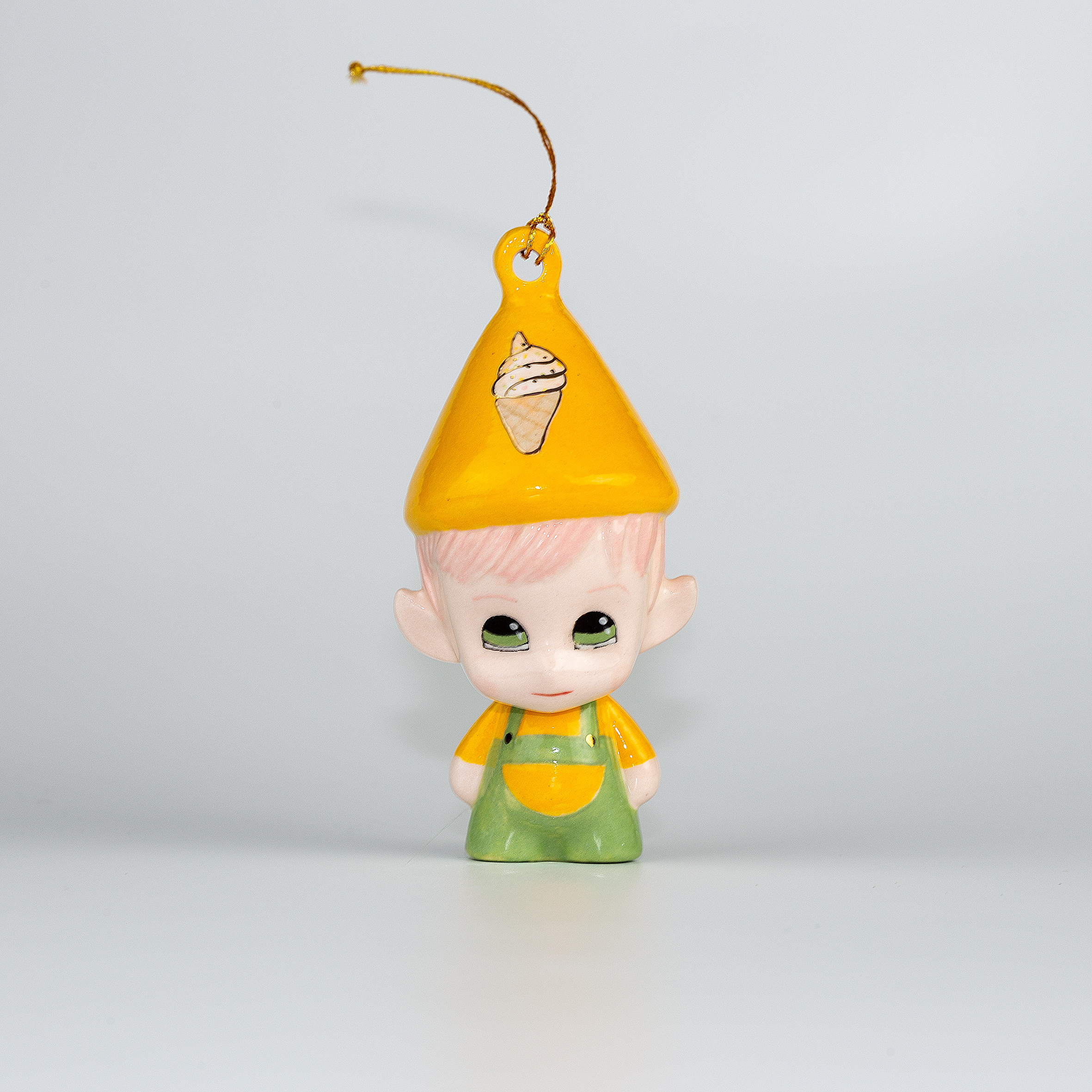 Candy from Dairy Delights. One-of-a-kind Handmade Porcelain Christmas ELF figurine ornament.
