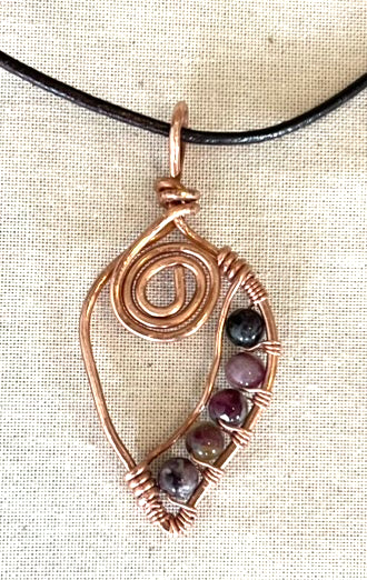 Unique Copper Spiral Gemstone Pendant with brown cord