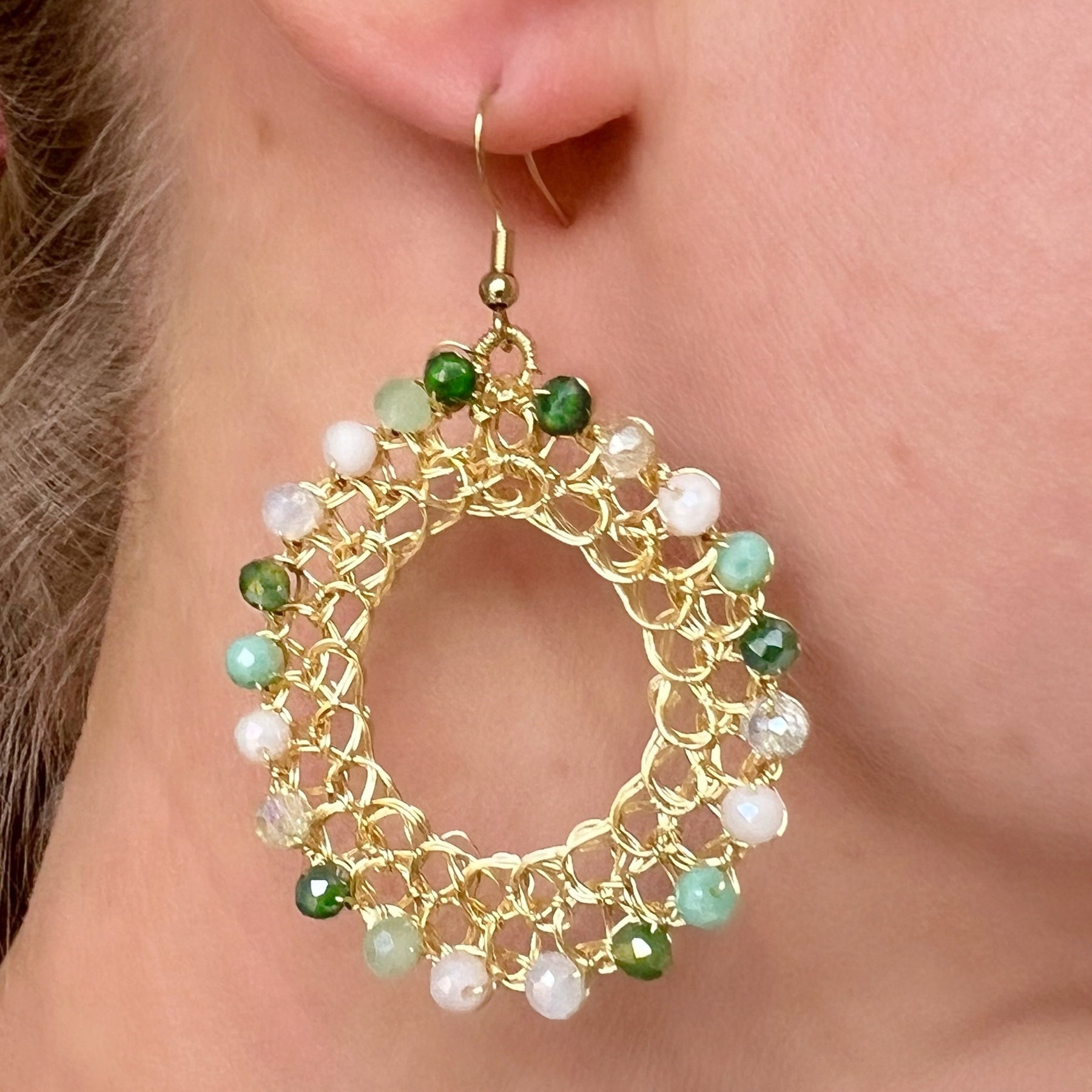 Gold wire hoop earrings with crystals