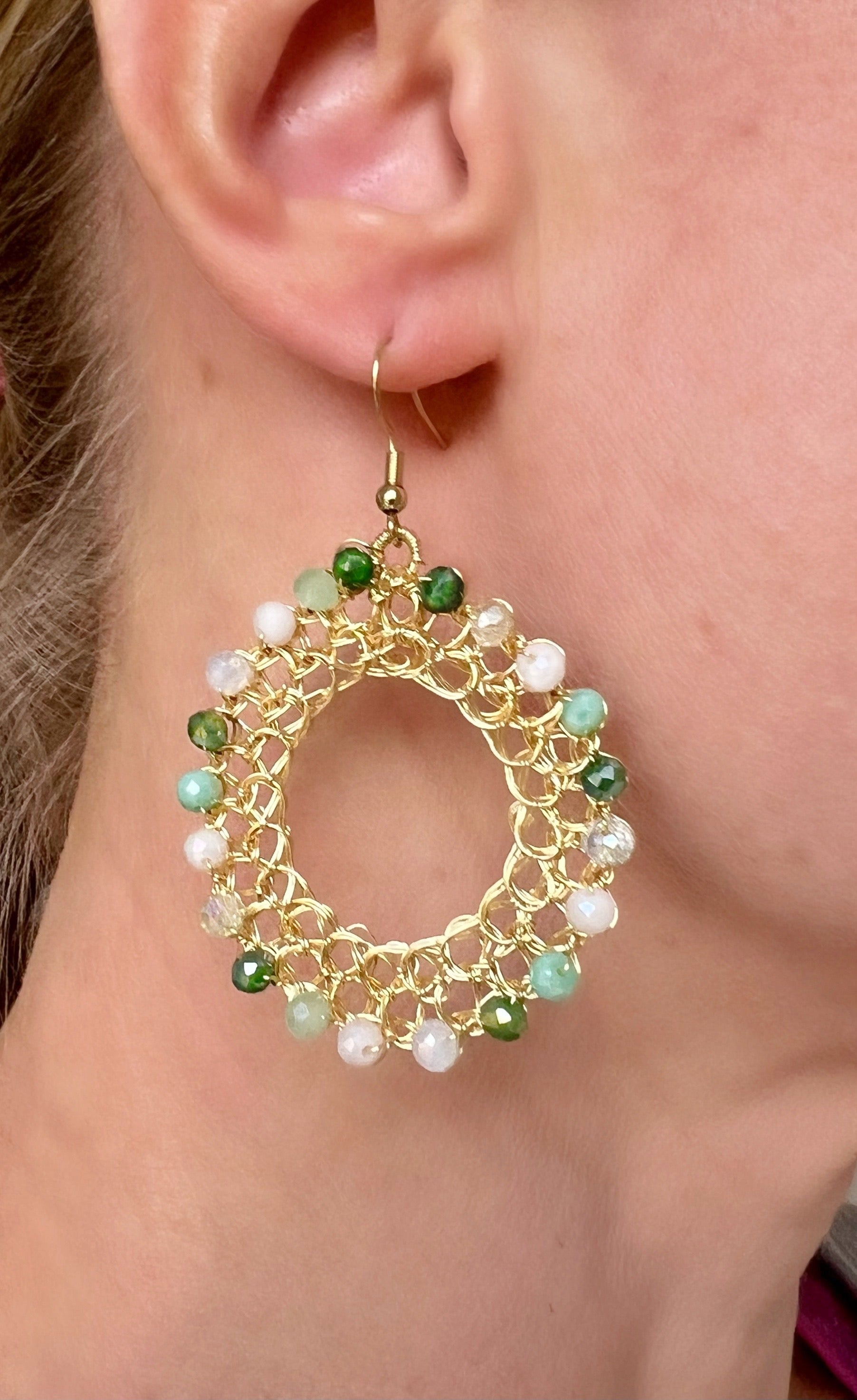 Gold wire hoop earrings with crystals