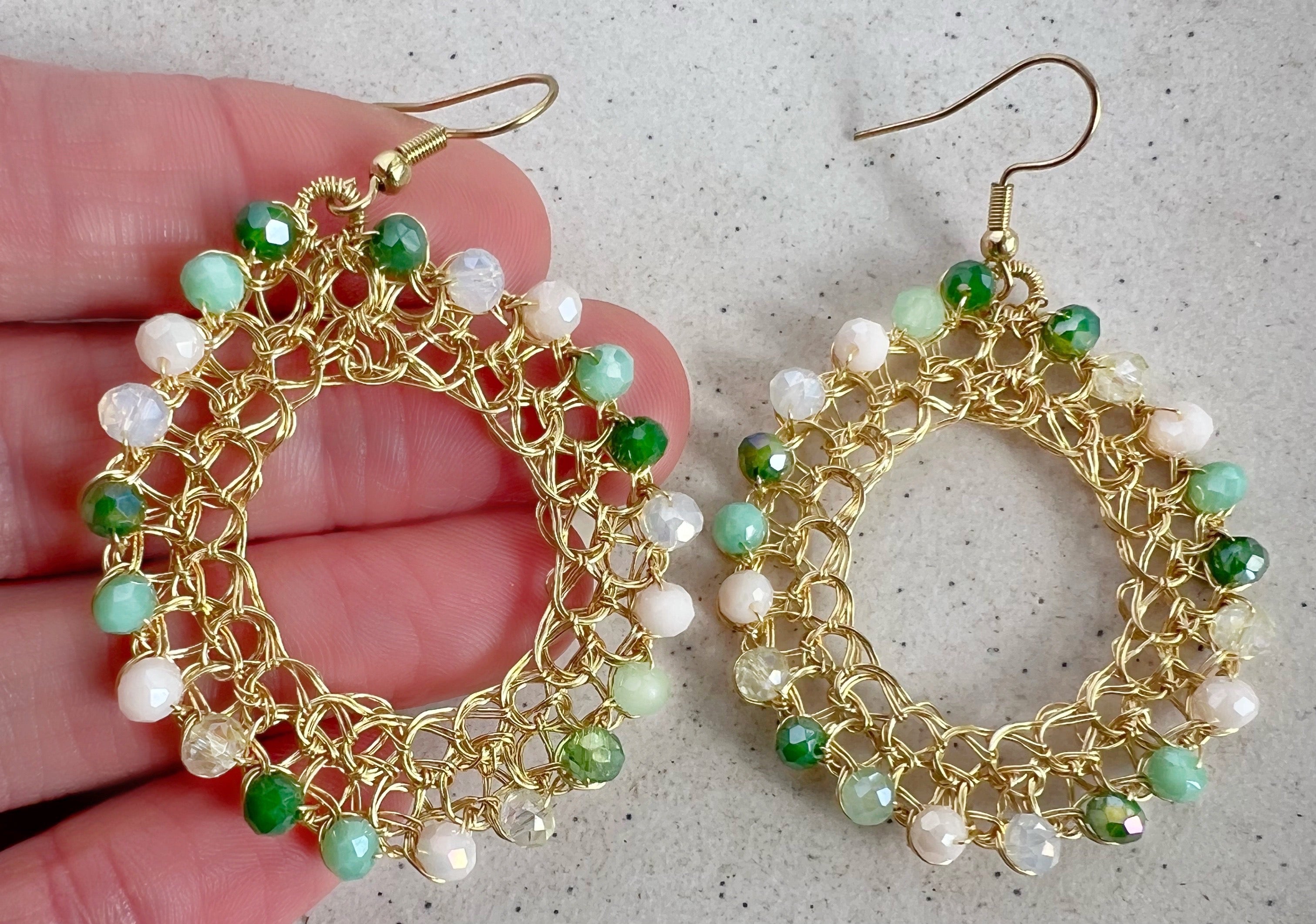 Gold wire hoop earrings with crystals