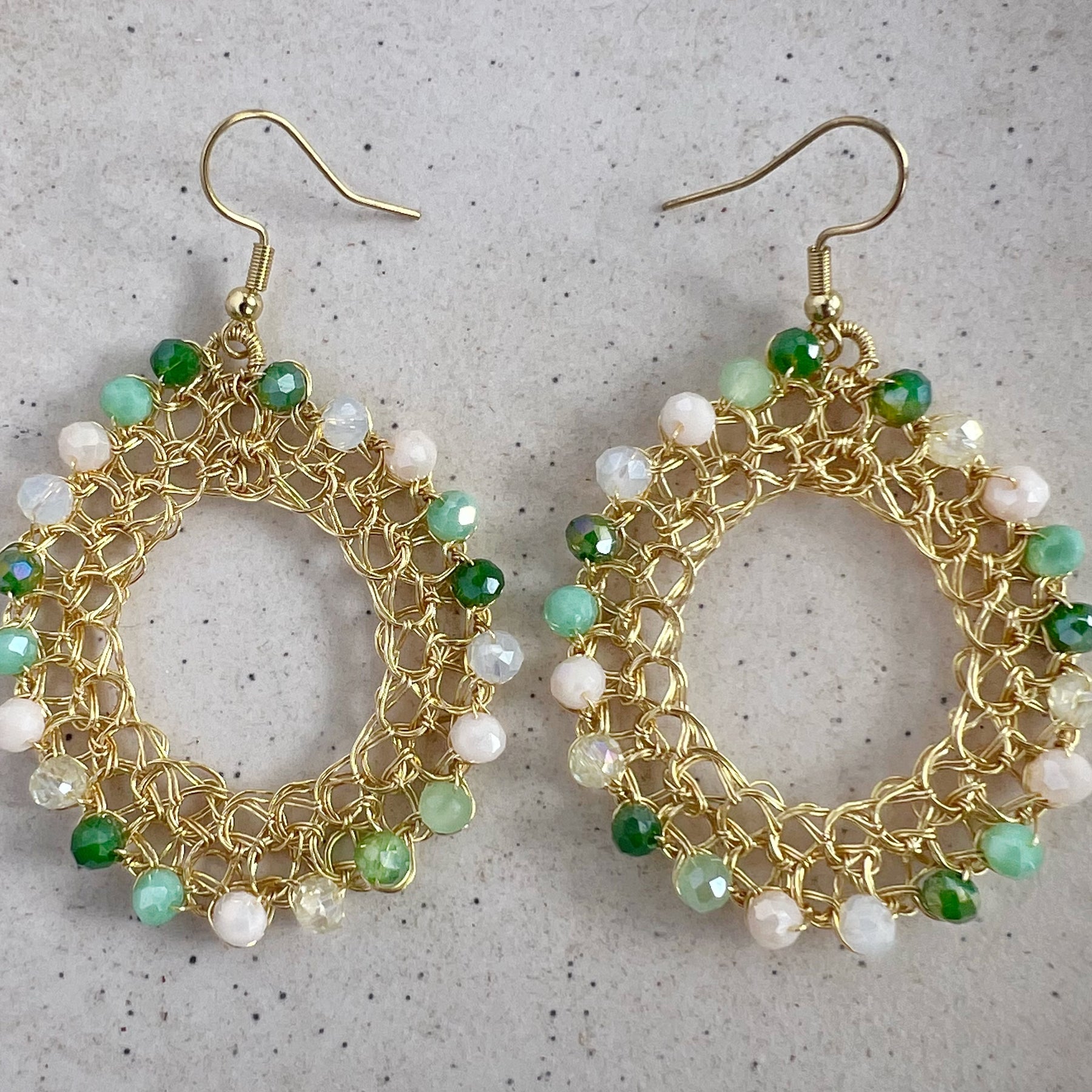 Gold wire hoop earrings with crystals