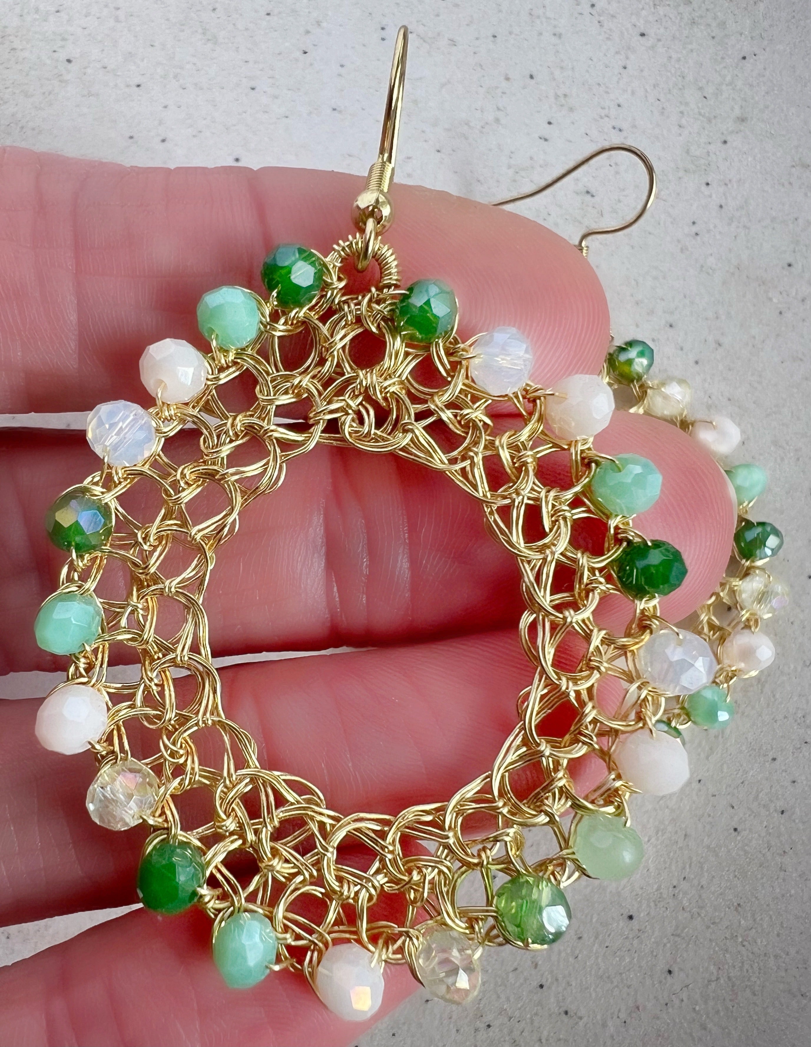 Gold wire hoop earrings with crystals