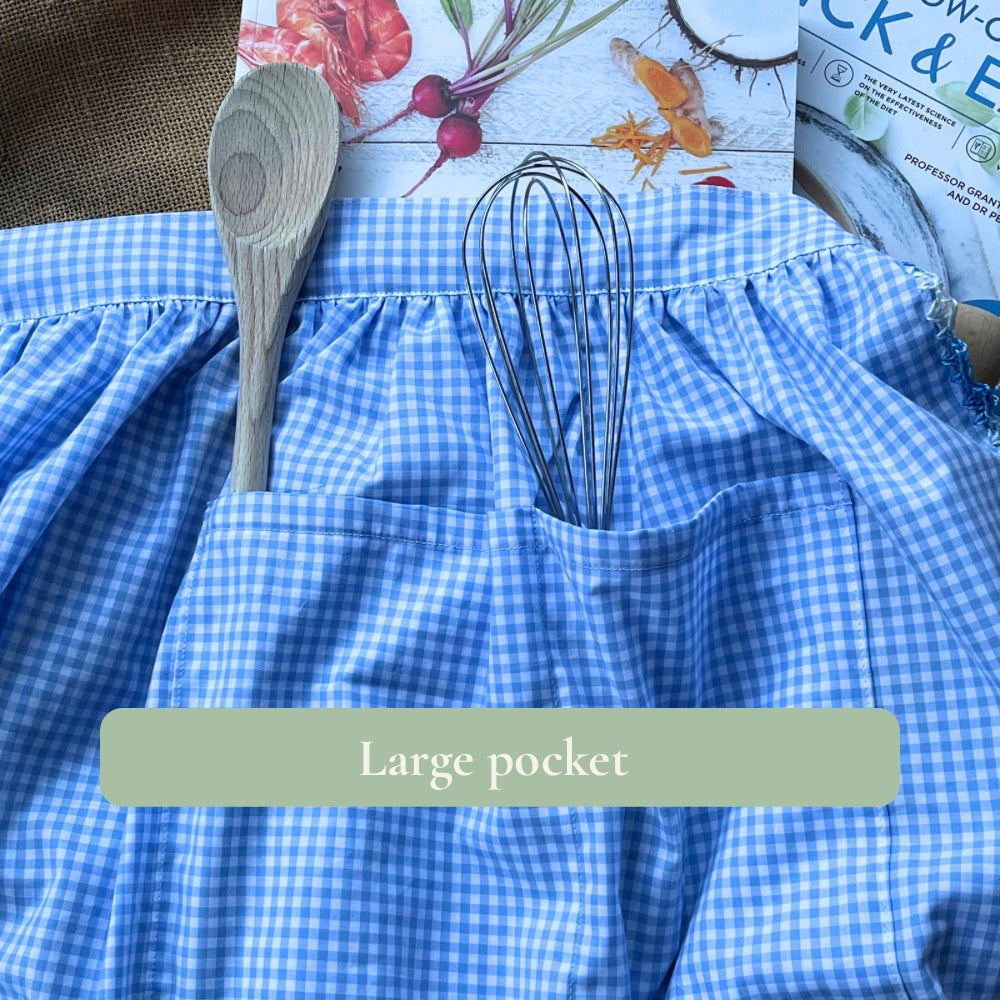 Blue gingham apron with hand crocheted lady