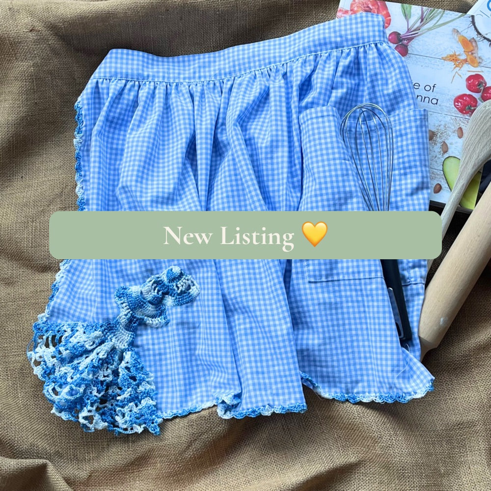 Blue gingham apron with hand crocheted lady