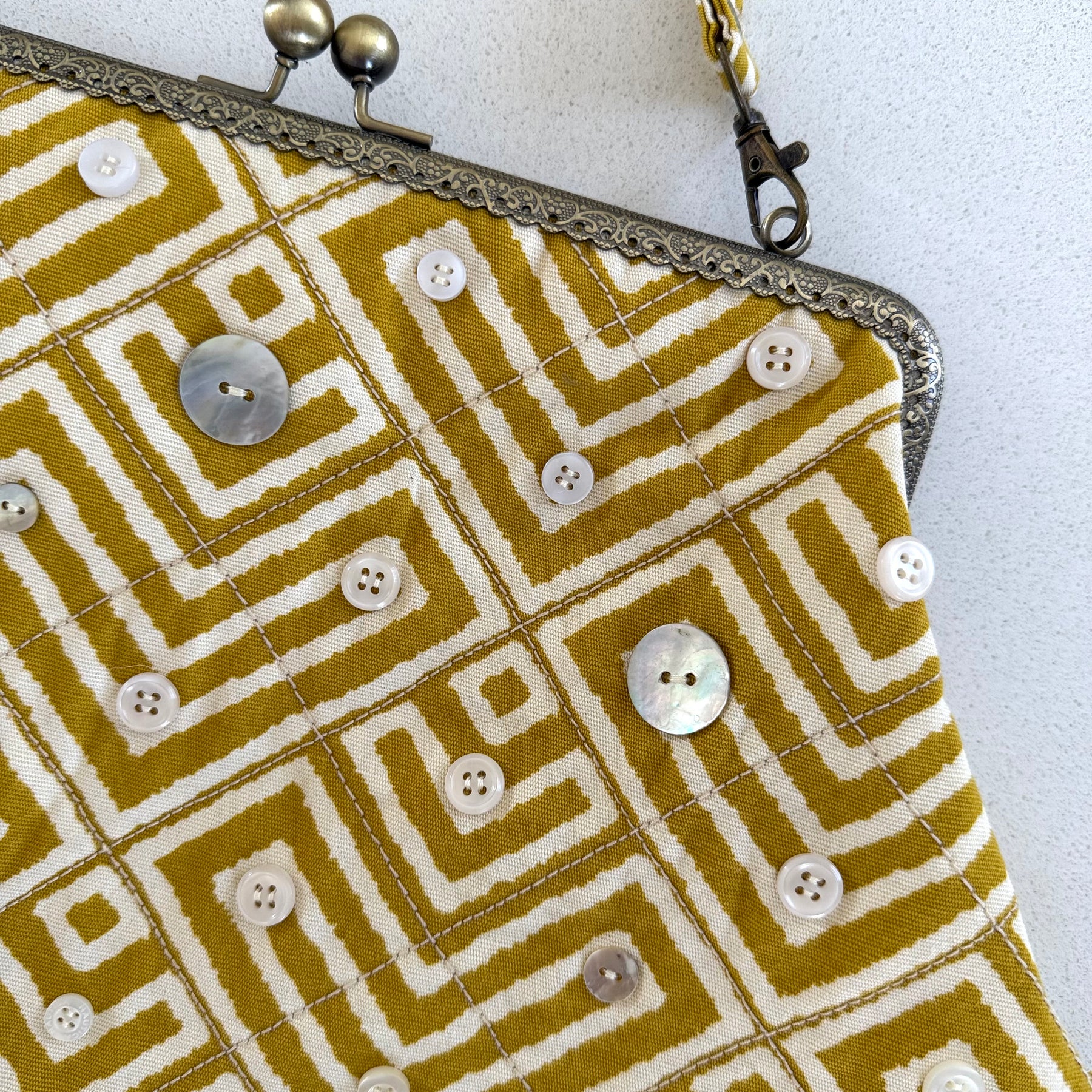 Metal frame oversized purse