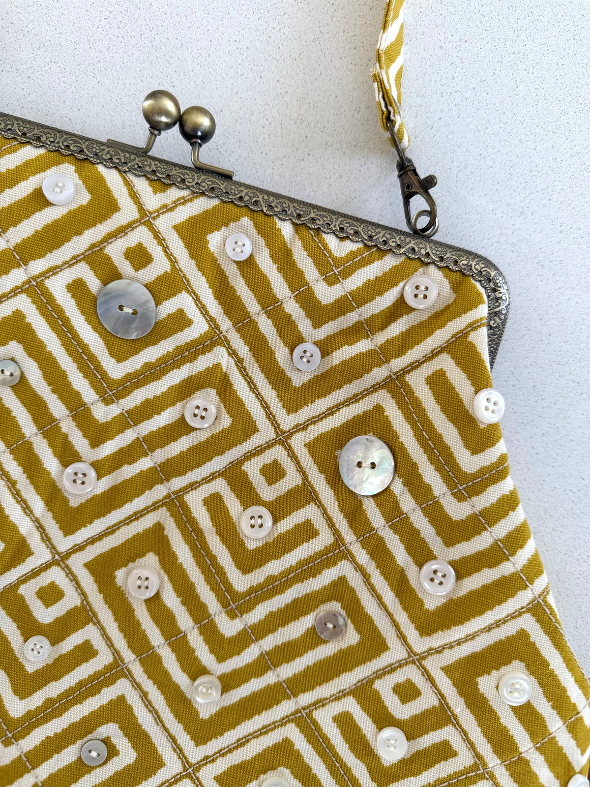 Metal frame oversized purse