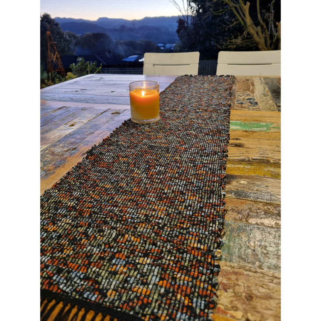 Woven black and orange floral tablerunner