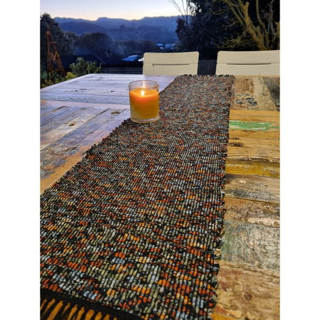 Woven black and orange floral tablerunner