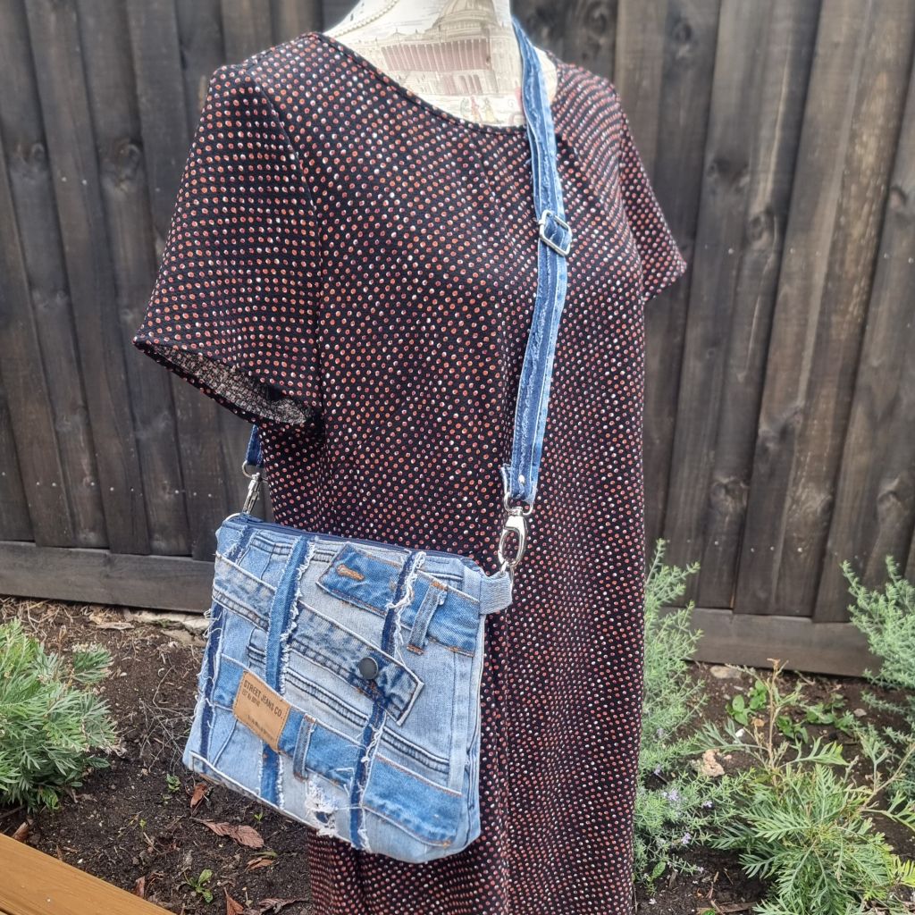 Handmade upcycled angle patched denim zip crossbody bag