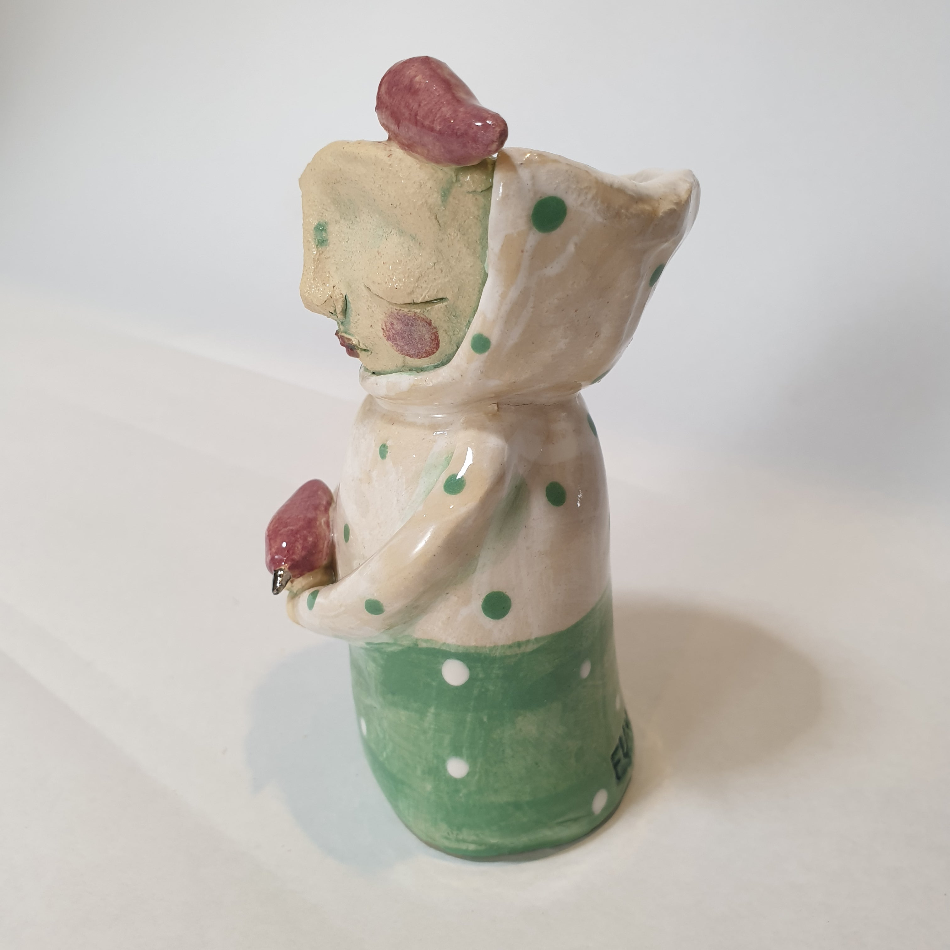 little figure, clay, green pink