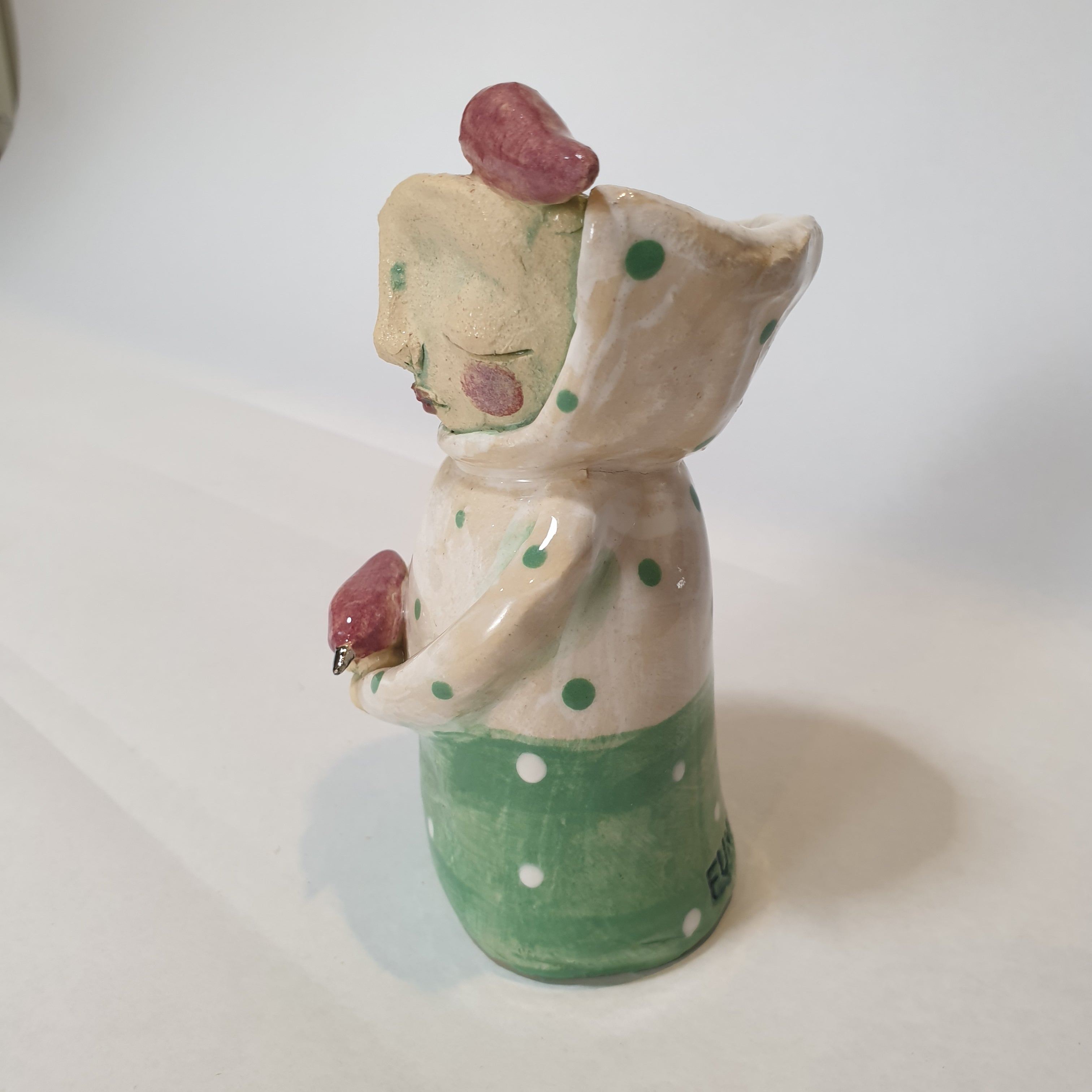 little figure, clay, green pink