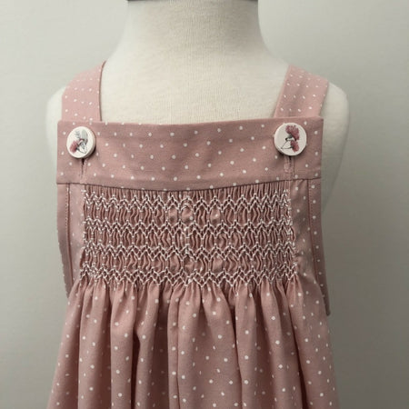 Hand-smocked baby romper - pale pink with white minispots & Australian flora buttons