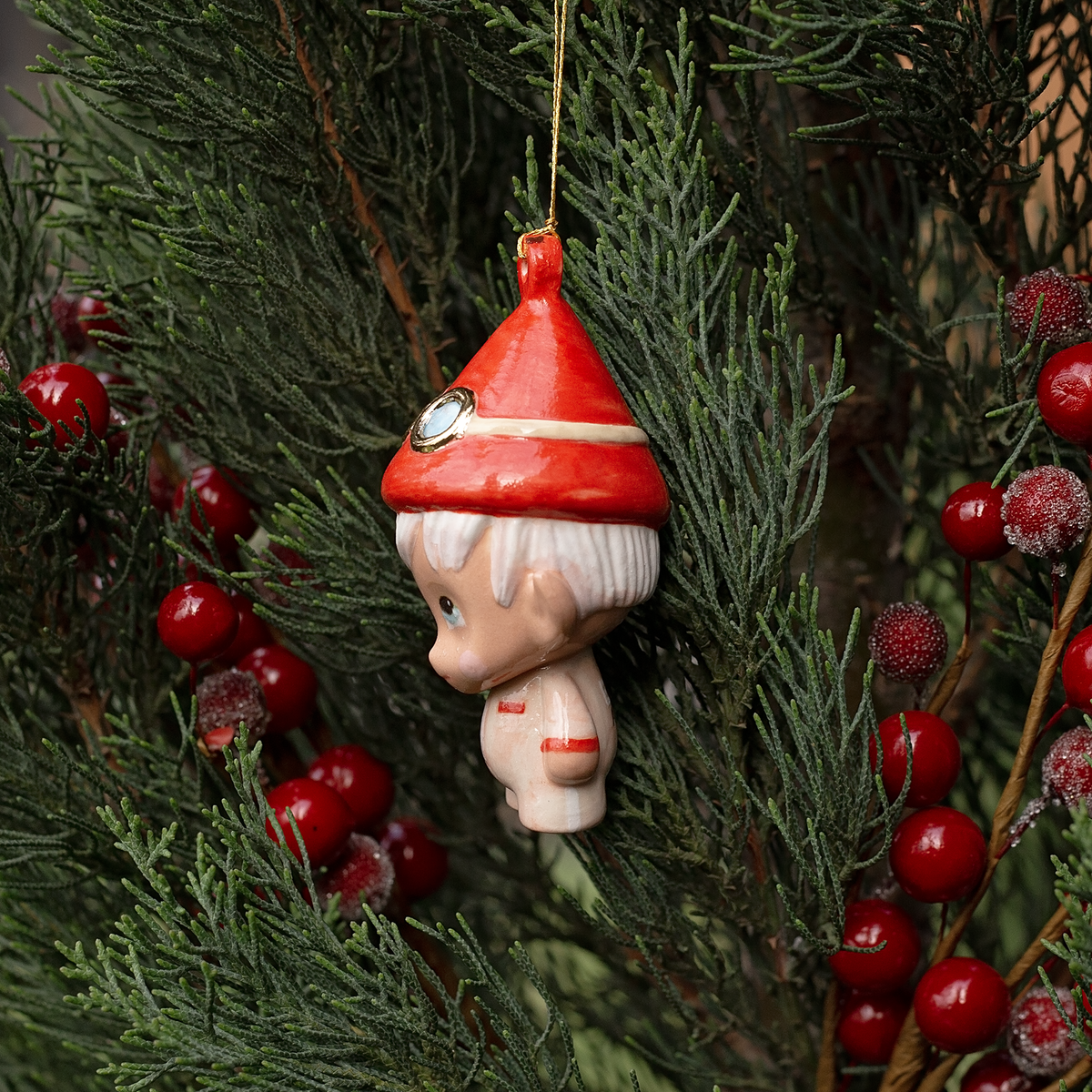 Handmade Porcelain Christmas ornament. One-of-a-kind. Zac, the sleigh mechanic Elf.