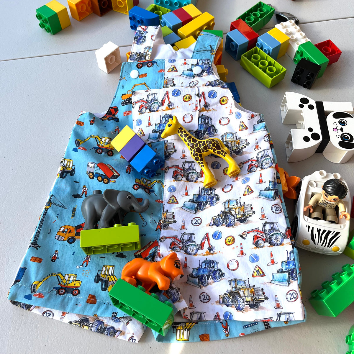 baby overalls/shorts | construction trucks