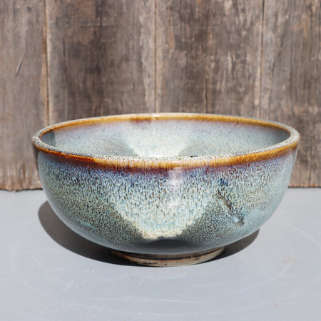 Stoneware bowls hand made with white speckled chun glaze over teadust brown.