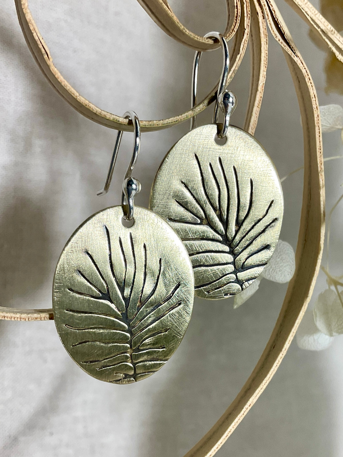 Brass embossed earrings. Handmade