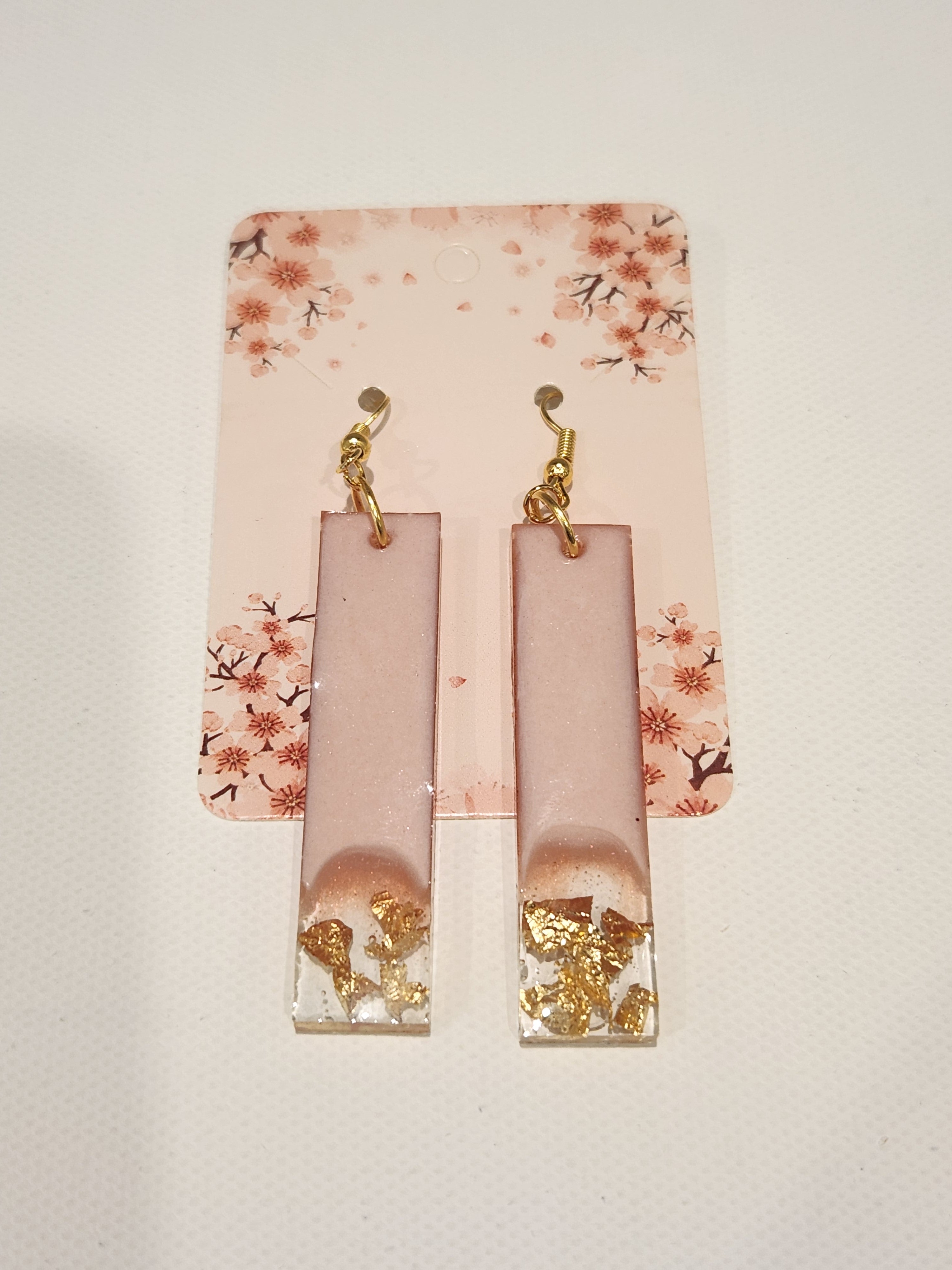 Drop earrings with metallic accents